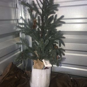 Brand new miniature faux Christmas trees for decorating
